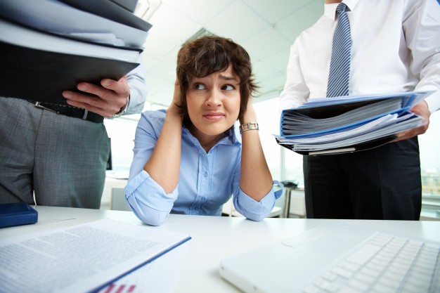 businesswoman-having-stress-in-the-office_1098-906